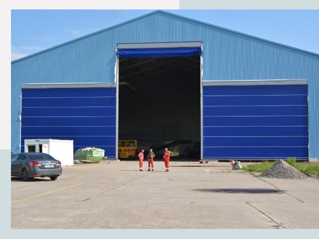 Ангарные ворота в Минусинск от СтальСтрой-Мнс по цене 610 руб.